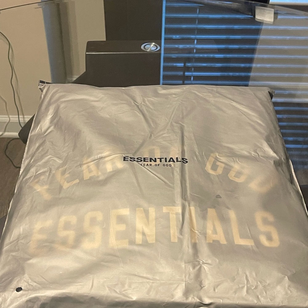 Fear of God Essentials Black Fleece Hoodie - Picture 4 of 9